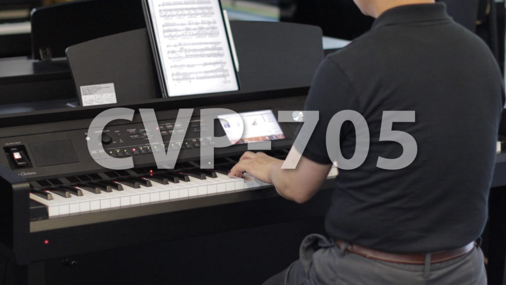 man learning to play the piano with the Yamaha CPV-705 clavinova